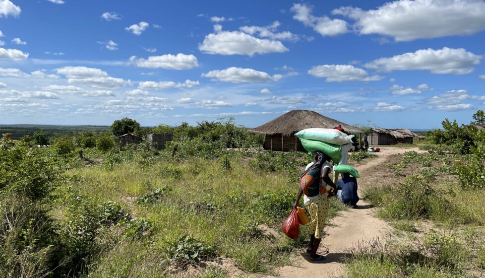 Women walking along a path in remote Africa