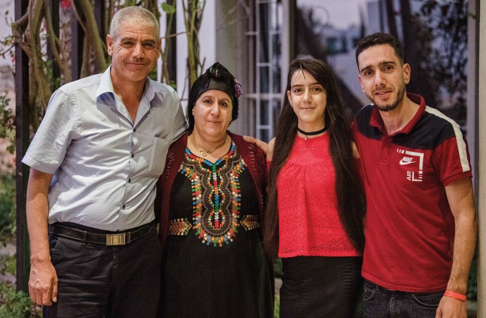 Algerian family standing together smiling